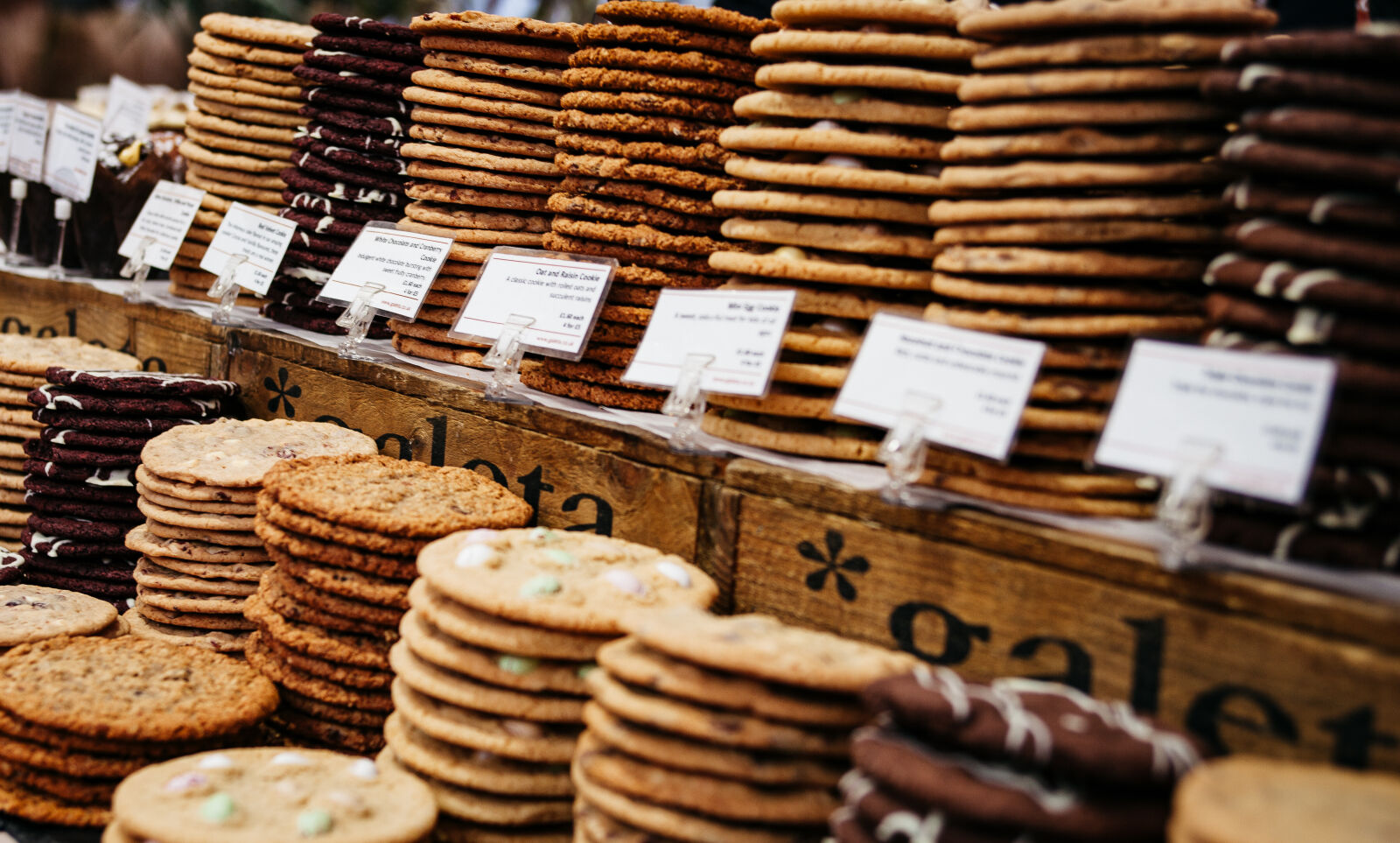 Canon EF 28-70mm f/2.8L USM sample photo. Abundance, bazaar, biscuits, blur photography