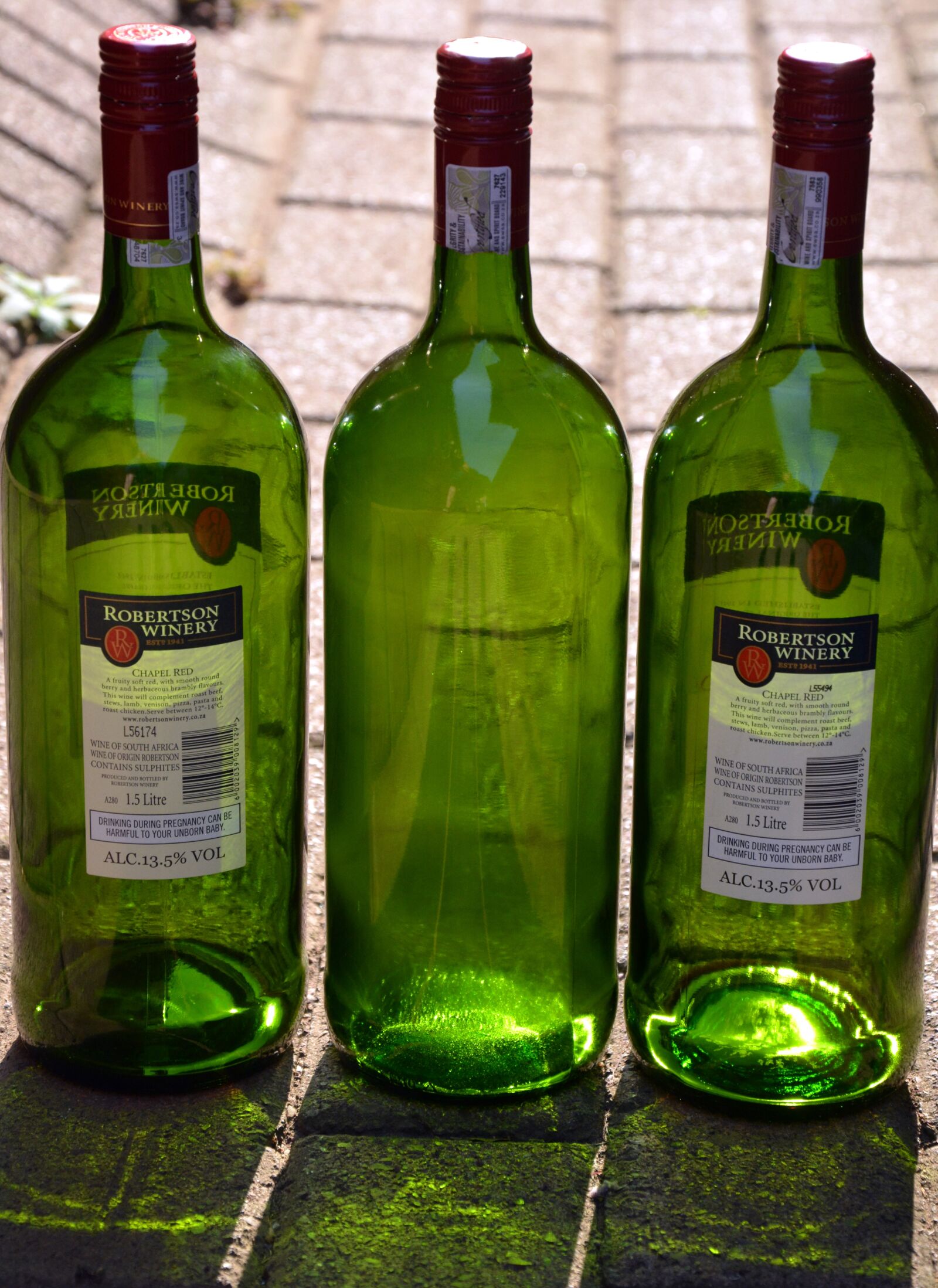 Nikon D5200 sample photo. Wine bottles, labels, glass photography