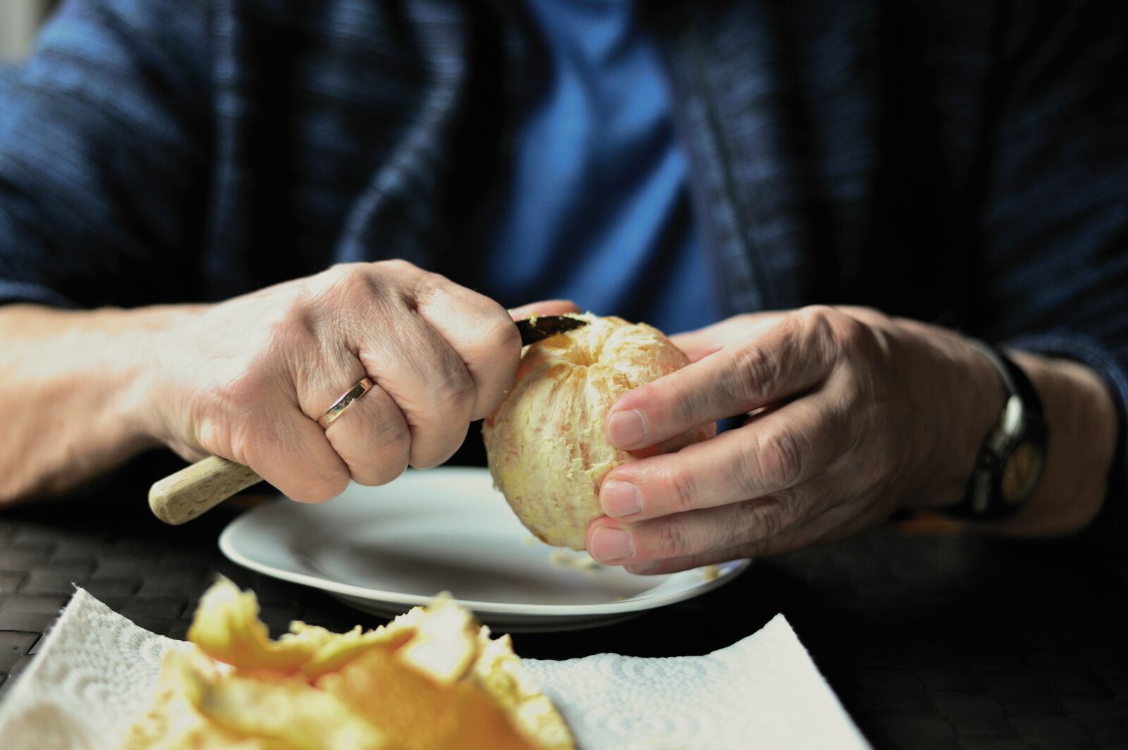 Nikon D610 sample photo. Hands, peel, orange photography
