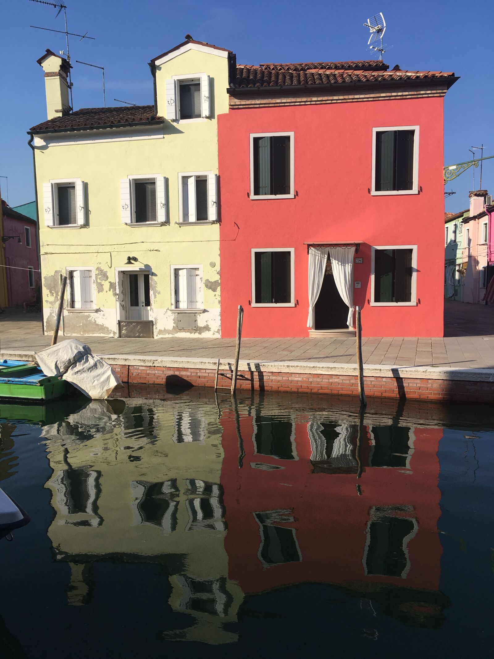 iPhone SE back camera 4.15mm f/2.2 sample photo. Channel, architecture, colored houses photography
