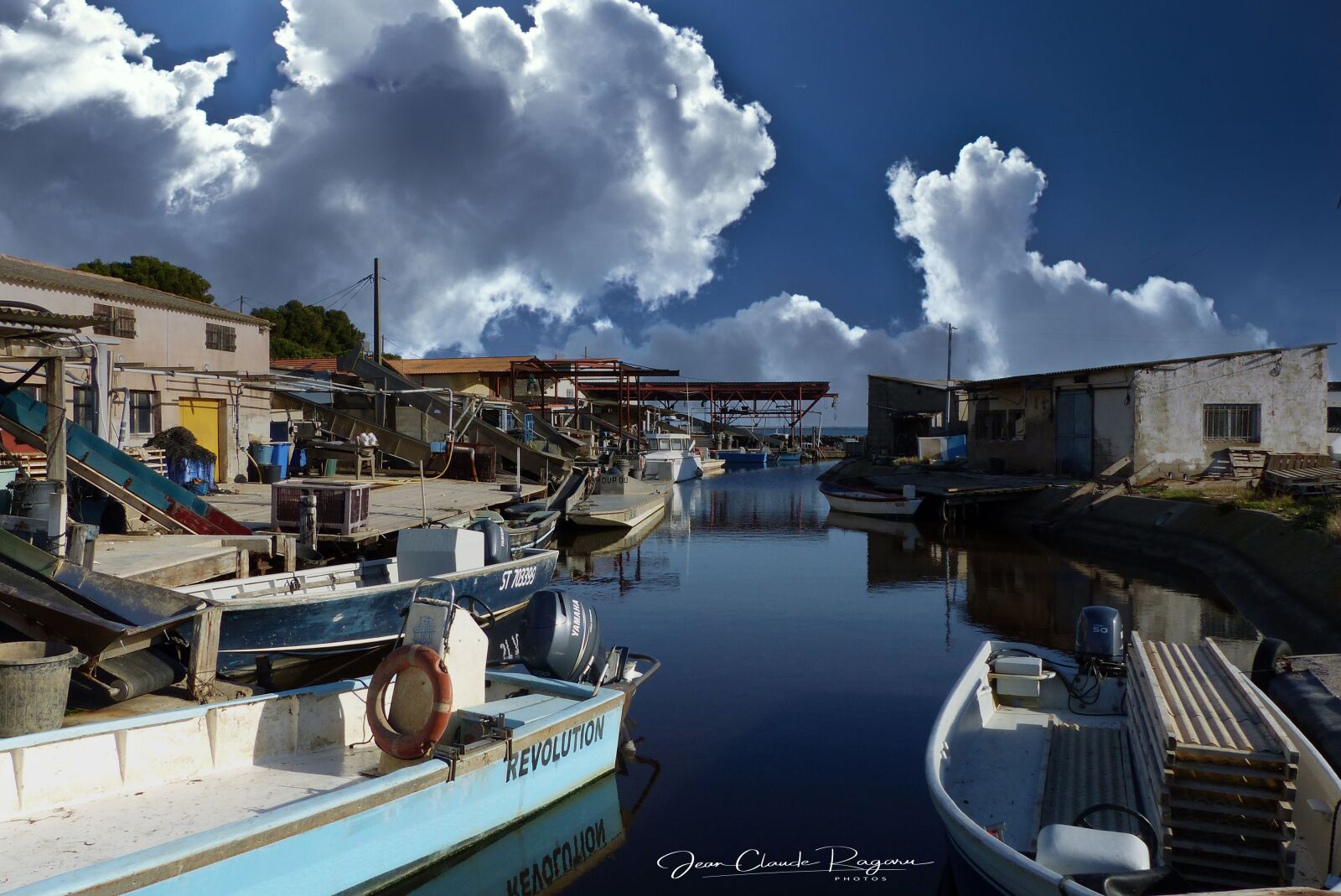 Panasonic Lumix DMC-FZ200 sample photo. Port, pond, clouds photography