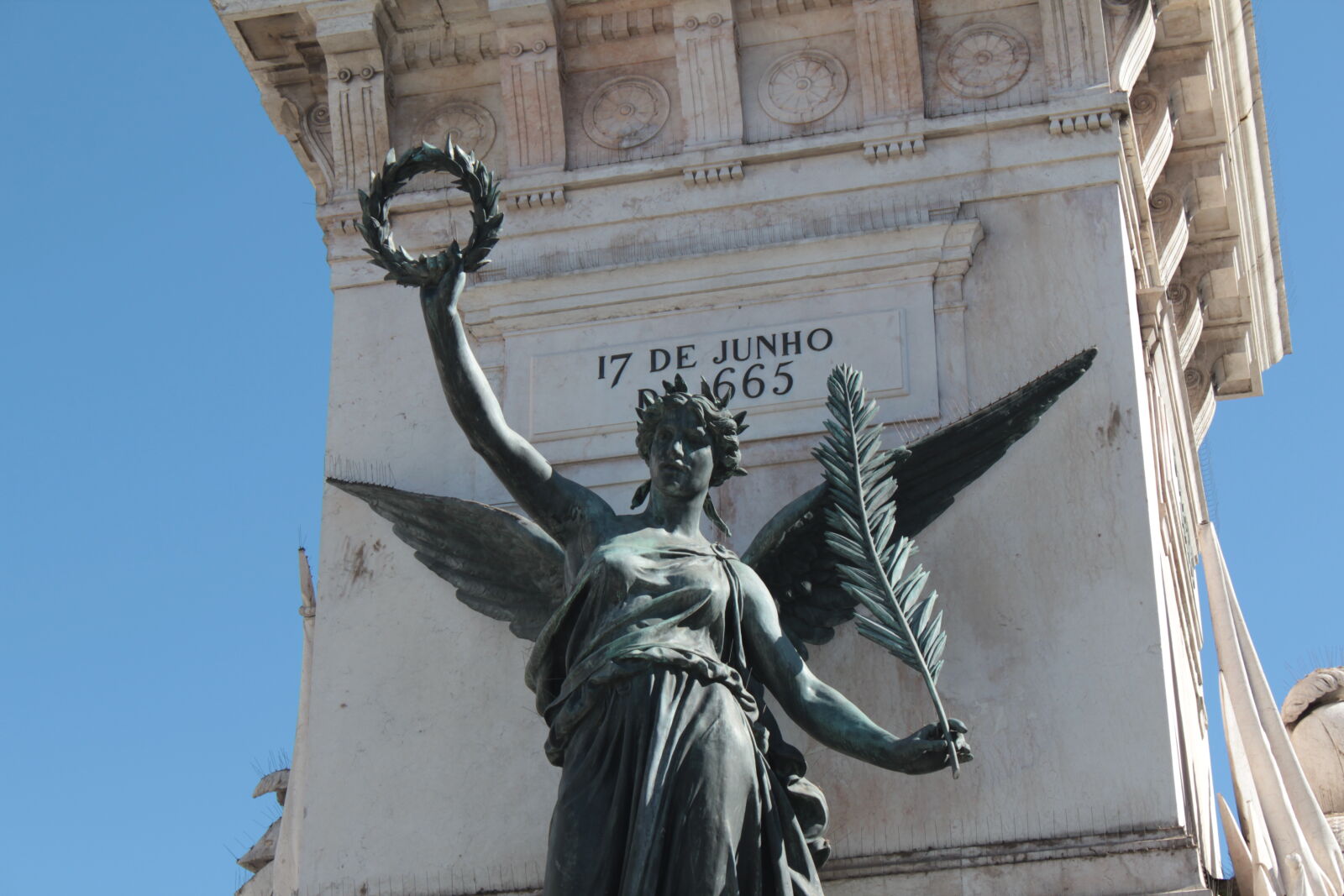 Canon EOS 550D (EOS Rebel T2i / EOS Kiss X4) sample photo. Lisbon, portugal, statue, woman photography