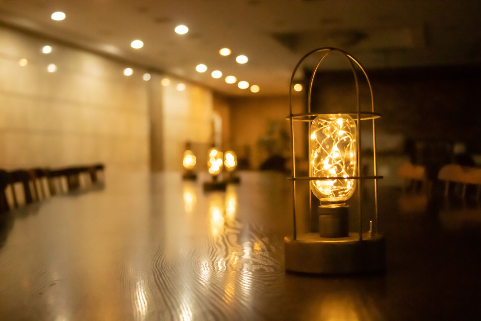 Canon EF 28-135mm F3.5-5.6 IS USM sample photo. Light fixtures, warm, indoor photography