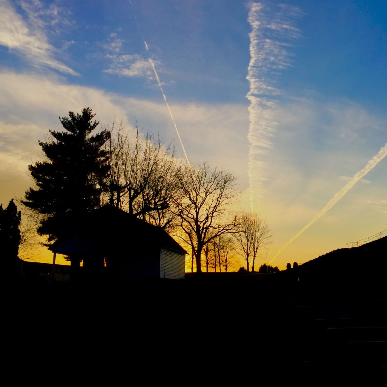iPhone 6 Plus back camera 4.15mm f/2.2 sample photo. Sunset, jet streams, sky photography