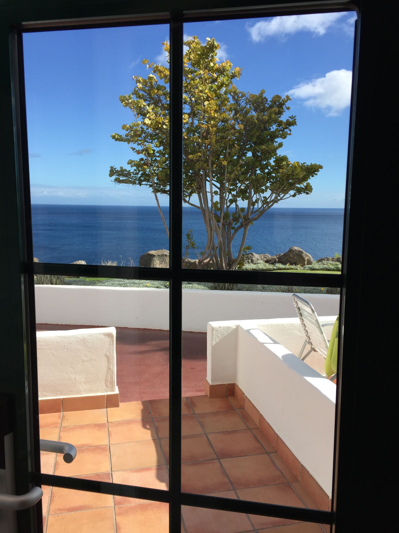 Apple iPhone 6 sample photo. Window, sea, calm photography