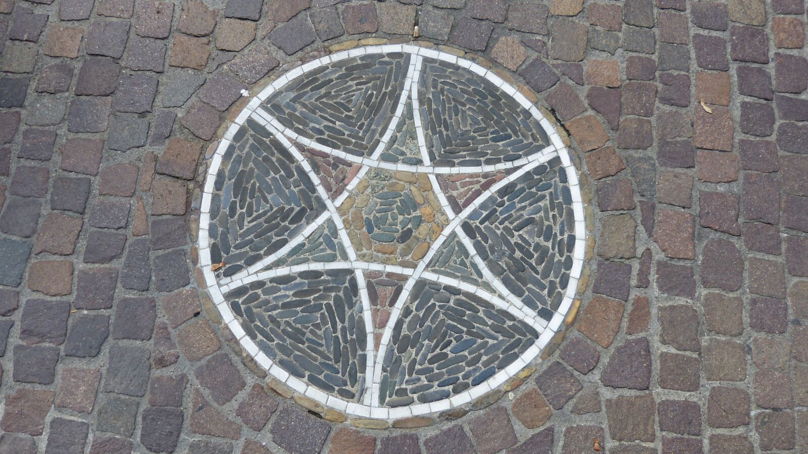 Panasonic Lumix DMC-FZ150 sample photo. Mosaic, road, symbols photography