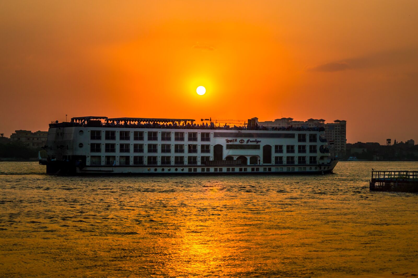 Nikon D3200 sample photo. Sunset, river, boat photography