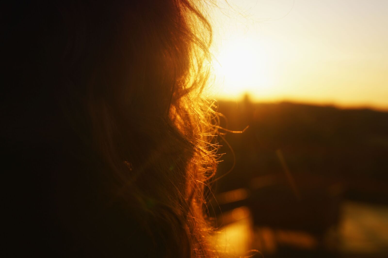 Sony Alpha DSLR-A500 sample photo. Sunrise, hair, woman photography