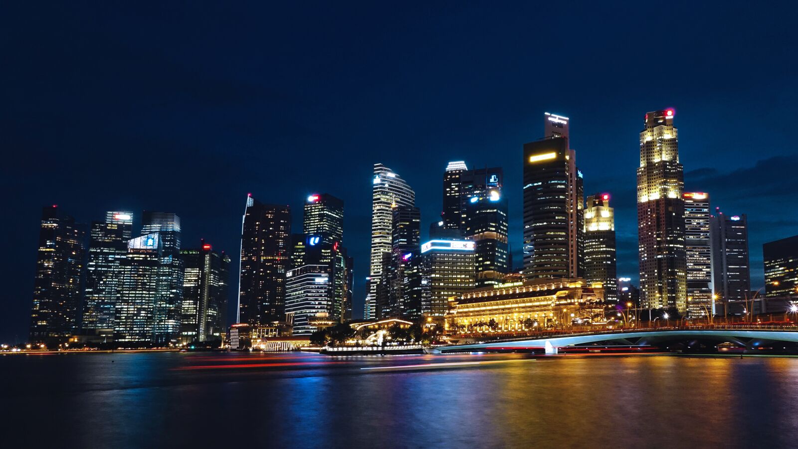 Sony Cyber-shot DSC-RX10 sample photo. Singapore river, skyline, building photography