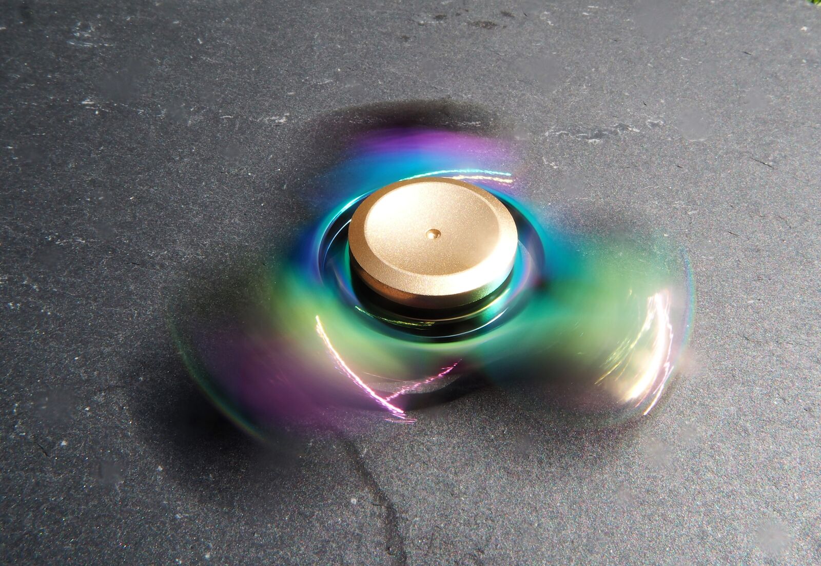 Olympus OM-D E-M10 sample photo. Fidget spinner, trend, toys photography