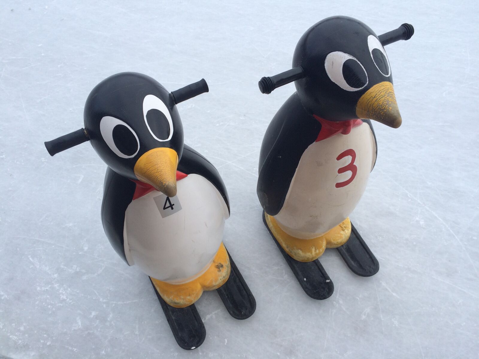 iPhone 5s back camera 4.15mm f/2.2 sample photo. Penguin, ice skating, twins photography