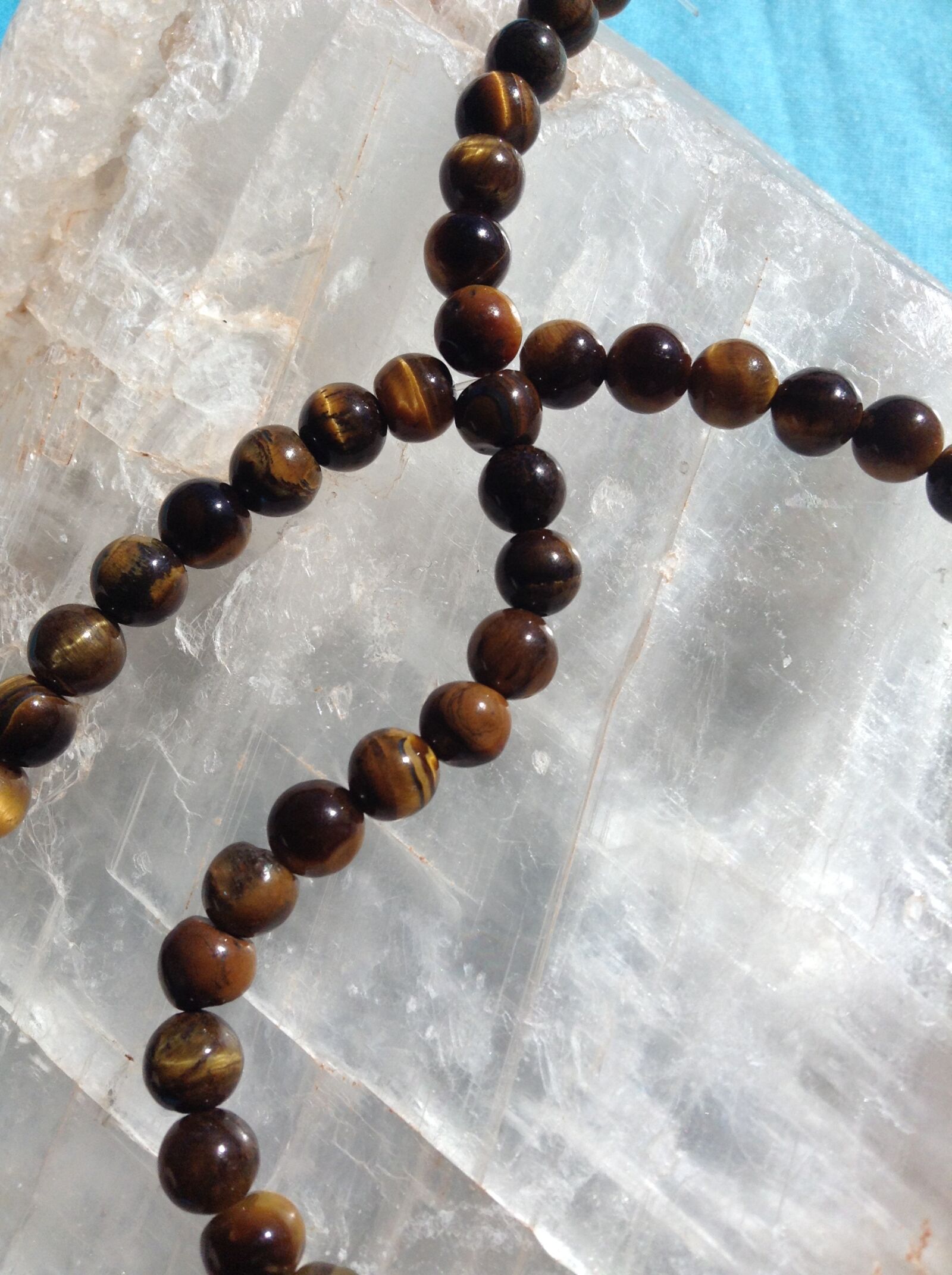 Apple iPad mini sample photo. Tiger's eye beads, gemstone photography