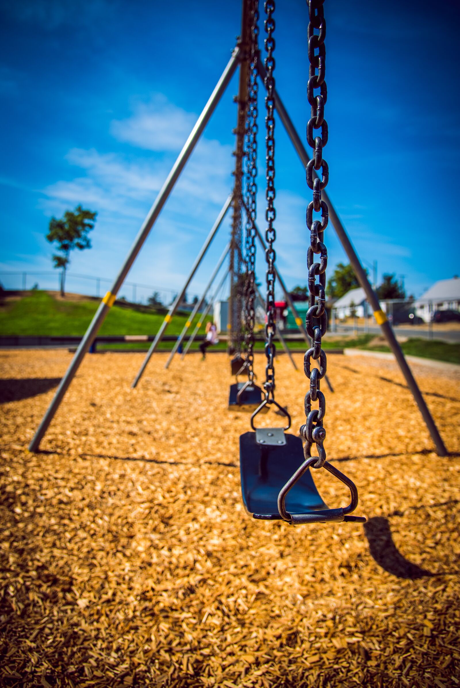 Nikon D750 sample photo. Swings, child, lonely photography