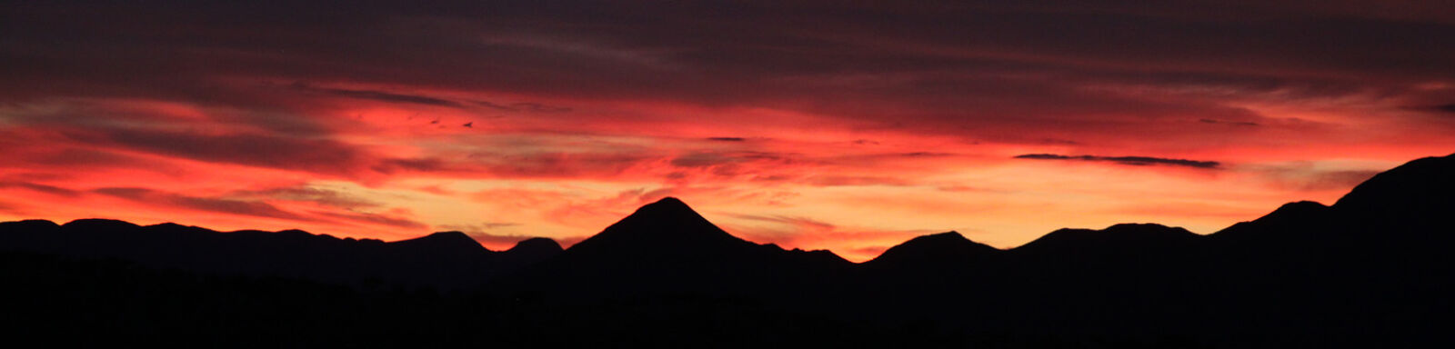 Canon EOS 500D (EOS Rebel T1i / EOS Kiss X3) sample photo. Silhouette, of, mountains, during photography