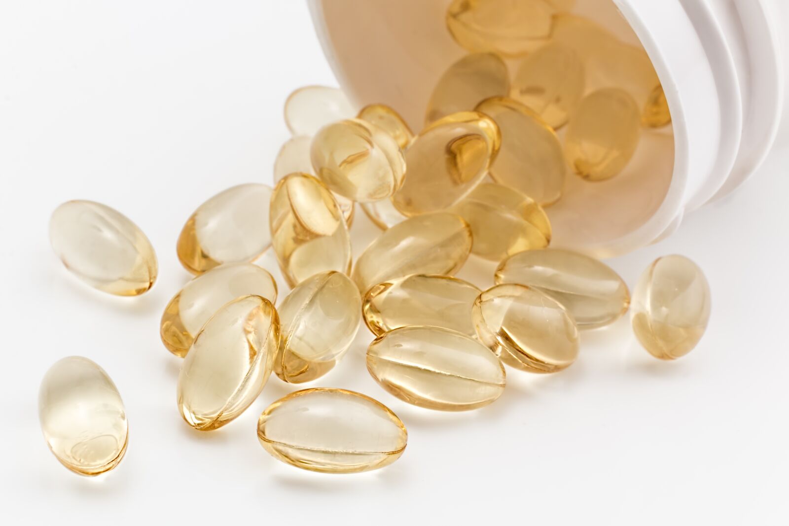Canon EOS 70D + Canon EF 50mm F1.4 USM sample photo. Pill, gel capsule, medicine photography