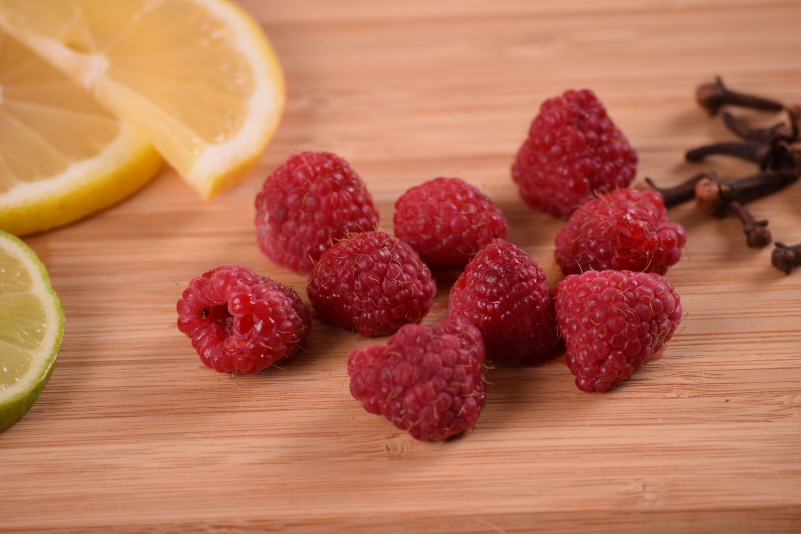 Nikon D3300 sample photo. Raspberries, lemon, lime photography