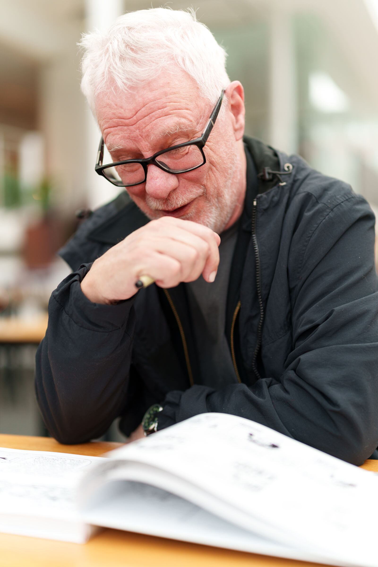 Sony a7R V sample photo. Old artist reading photography