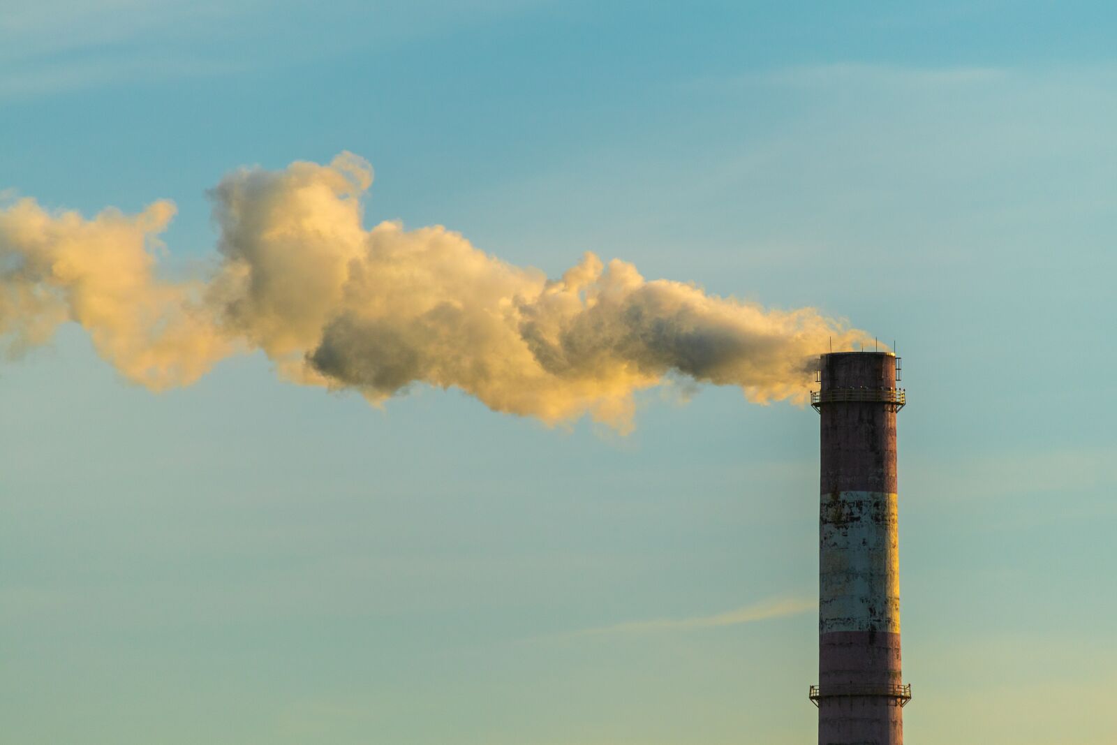 Nikon D5600 sample photo. Chimney, cloudy sky, smog photography