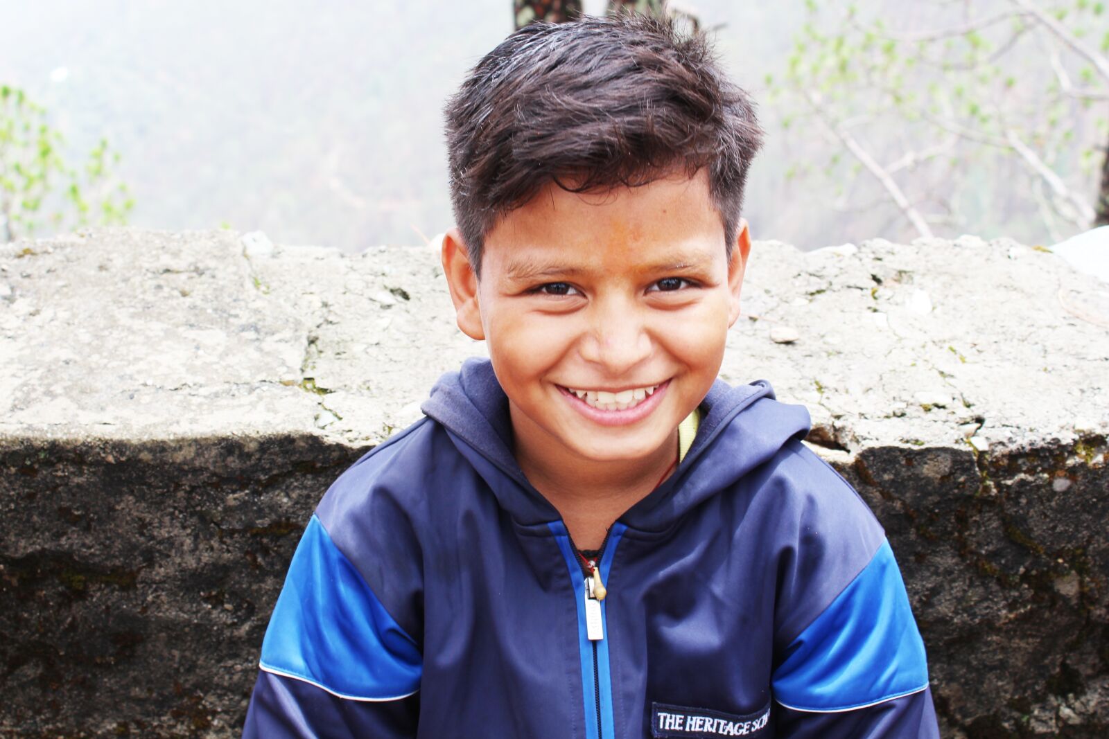Canon EOS 700D (EOS Rebel T5i / EOS Kiss X7i) sample photo. Himalayan boy, smile, happy photography