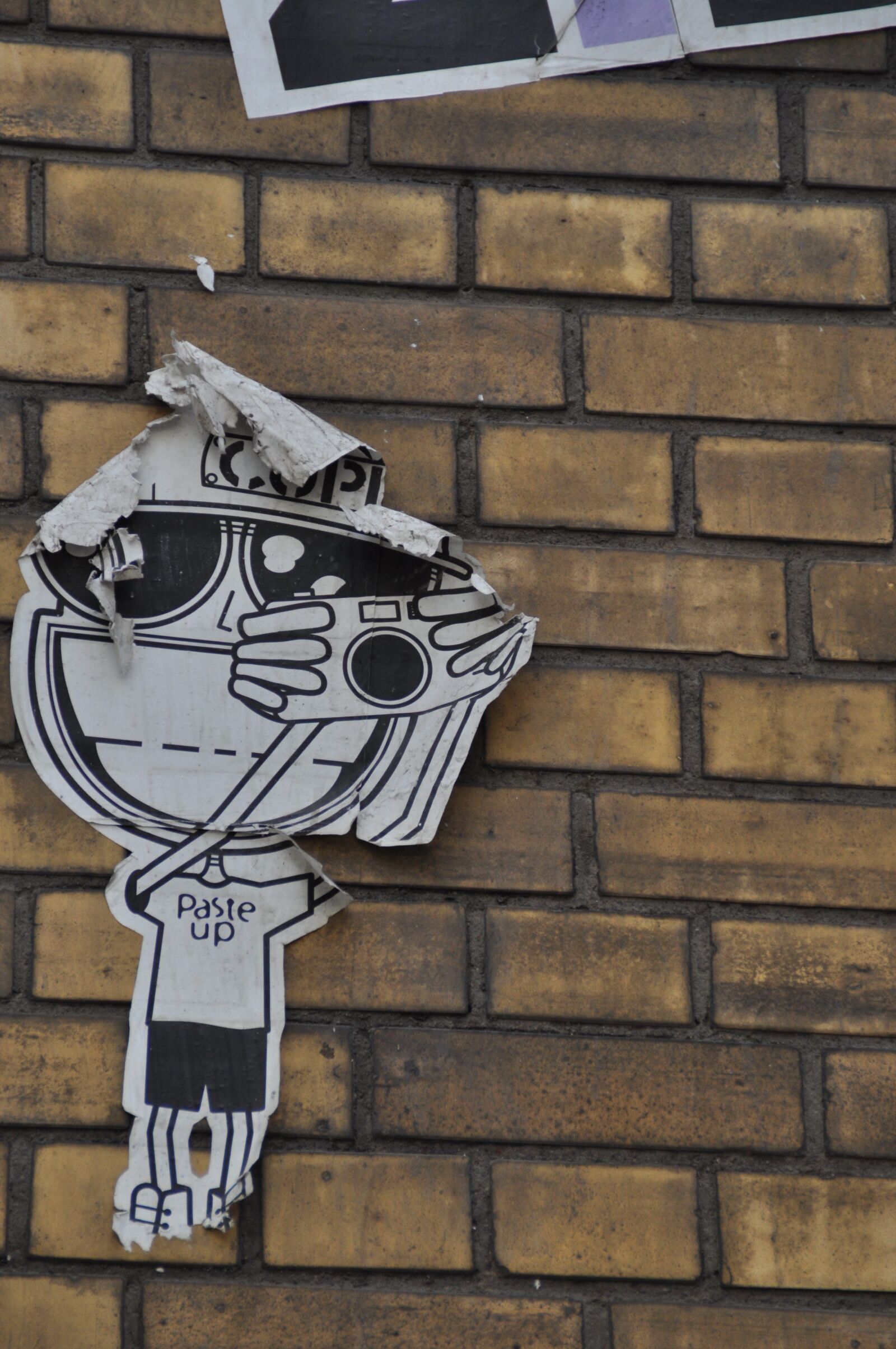 Nikon D5000 sample photo. Street art, sticker, hauswand photography