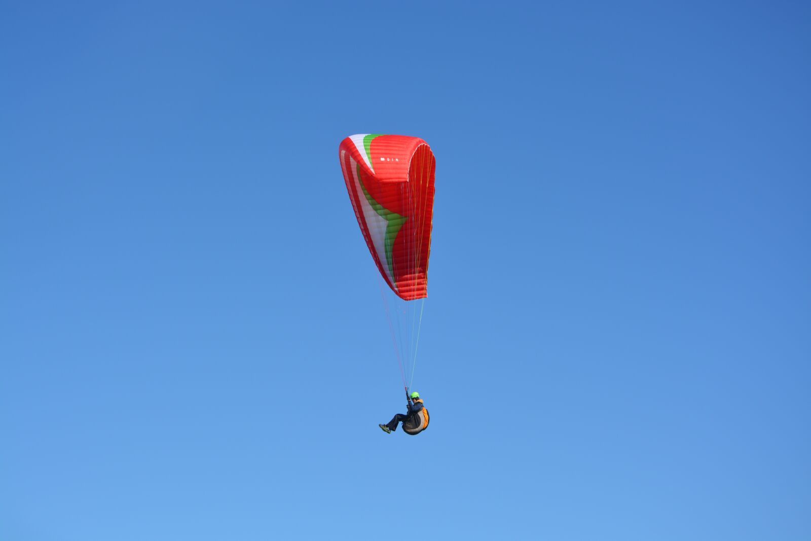 Nikon D5200 sample photo. Paragliding, red sail, blue photography