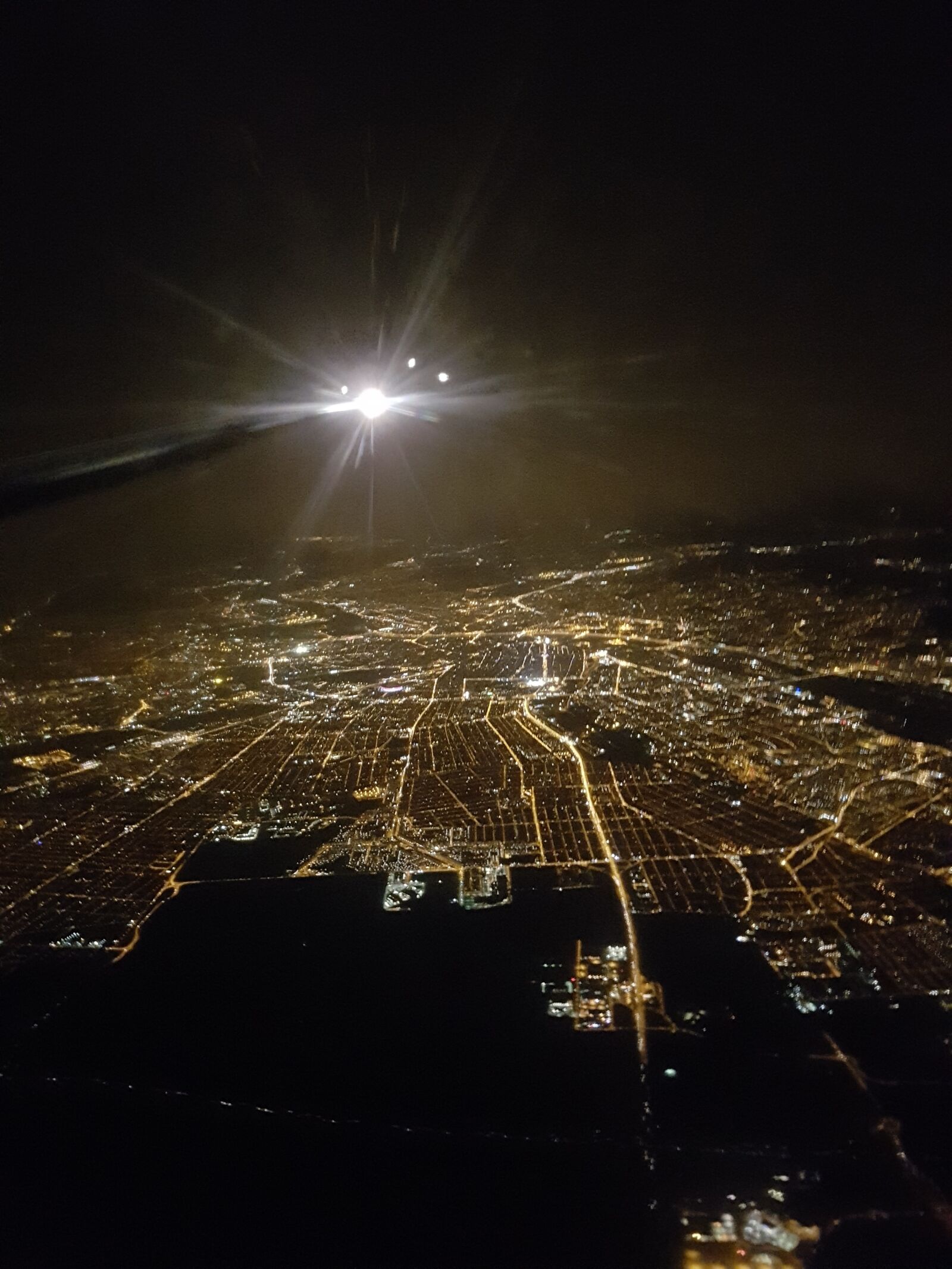 Samsung Galaxy S7 Edge sample photo. At night, plane, landing photography