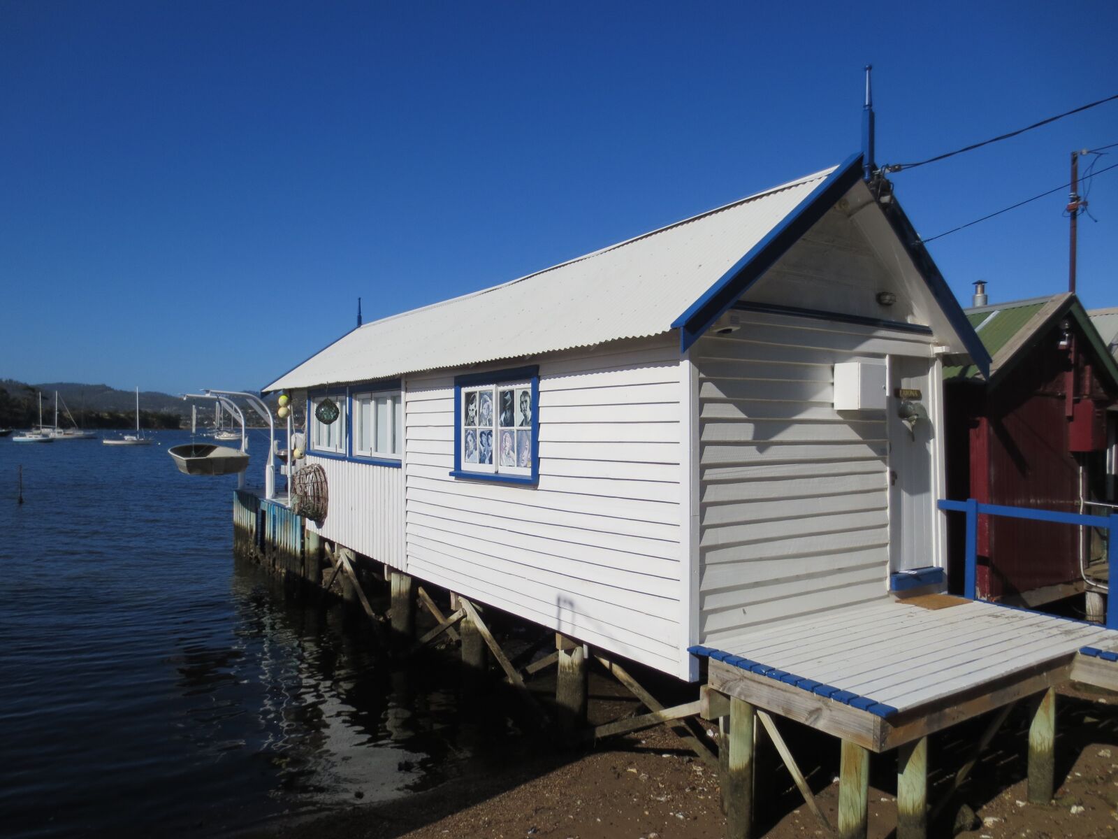 Canon IXUS 240 HS sample photo. Boathouse, waterfront, water photography