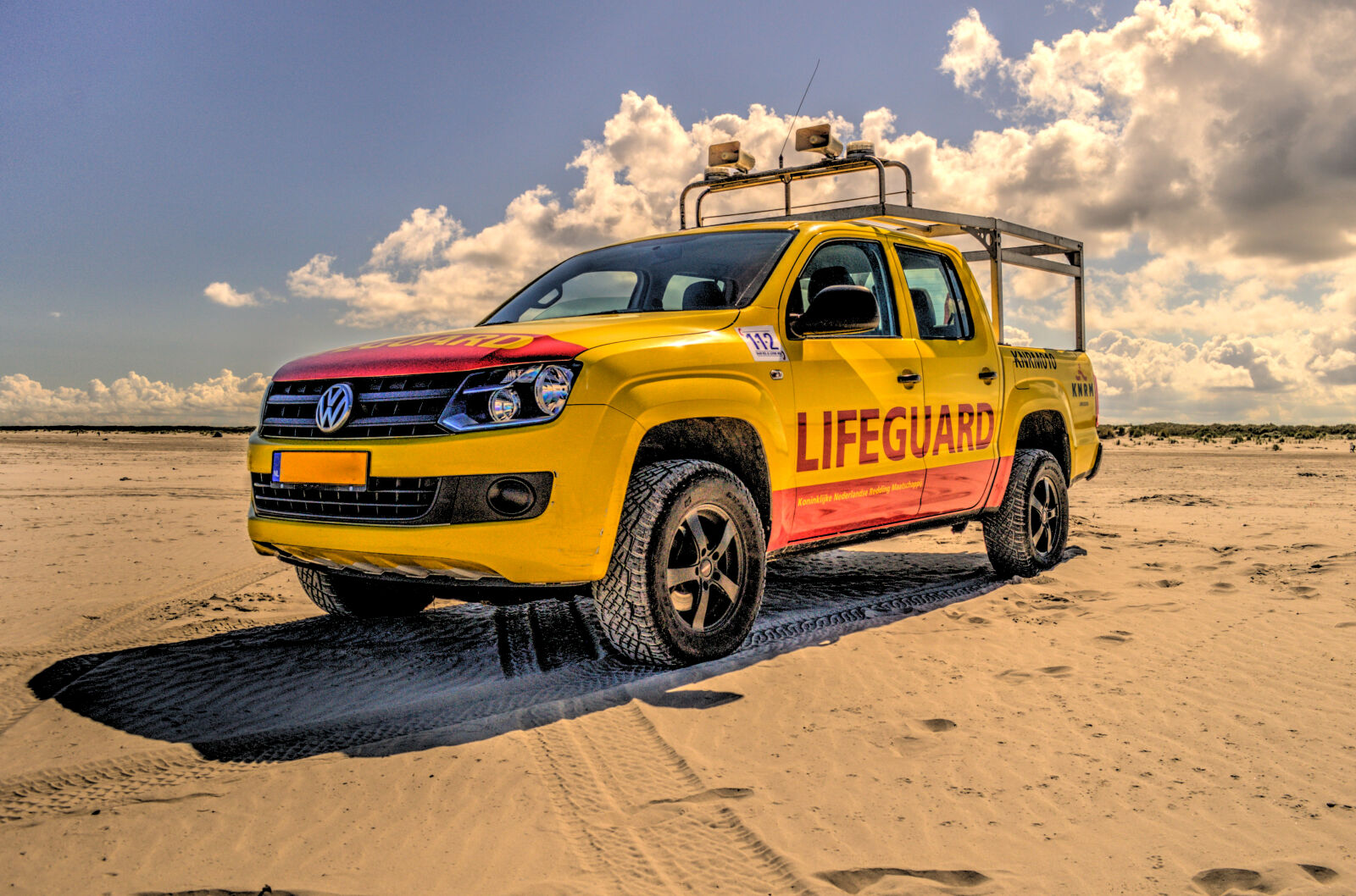 Nikon D5000 sample photo. Beach, holiday, clouds, lifeguard photography