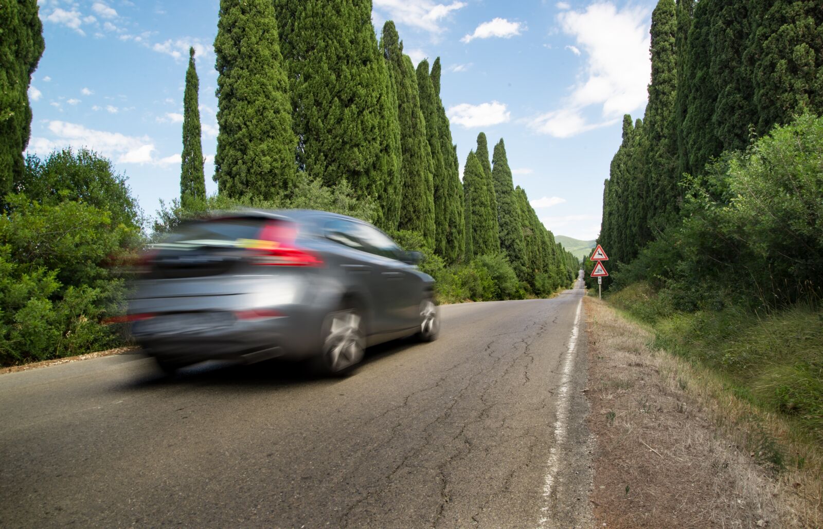 Nikon D610 sample photo. Road, car, motion photography