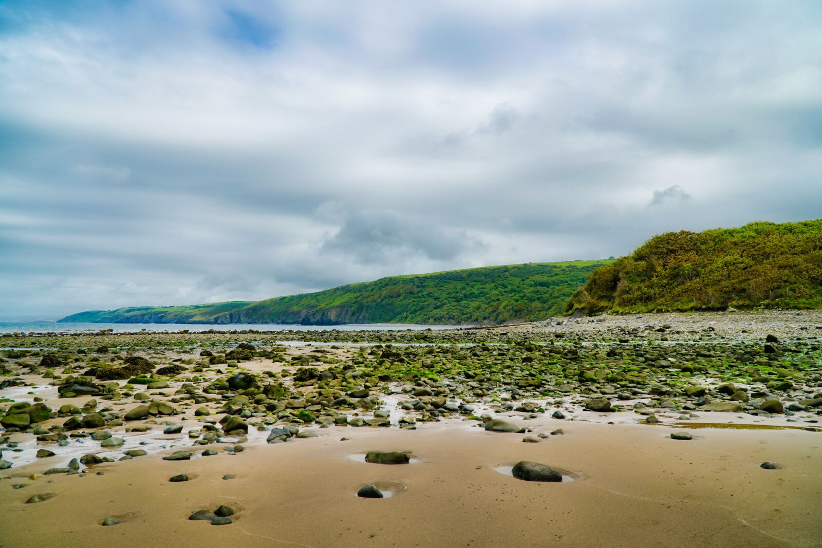 Sony a6300 + Sony E PZ 18-105mm F4 G OSS sample photo. Beach, sand, rocks photography