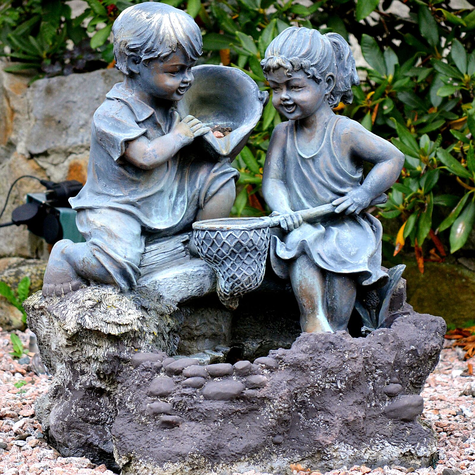 Nikon D5100 sample photo. Garden, figures, stone photography