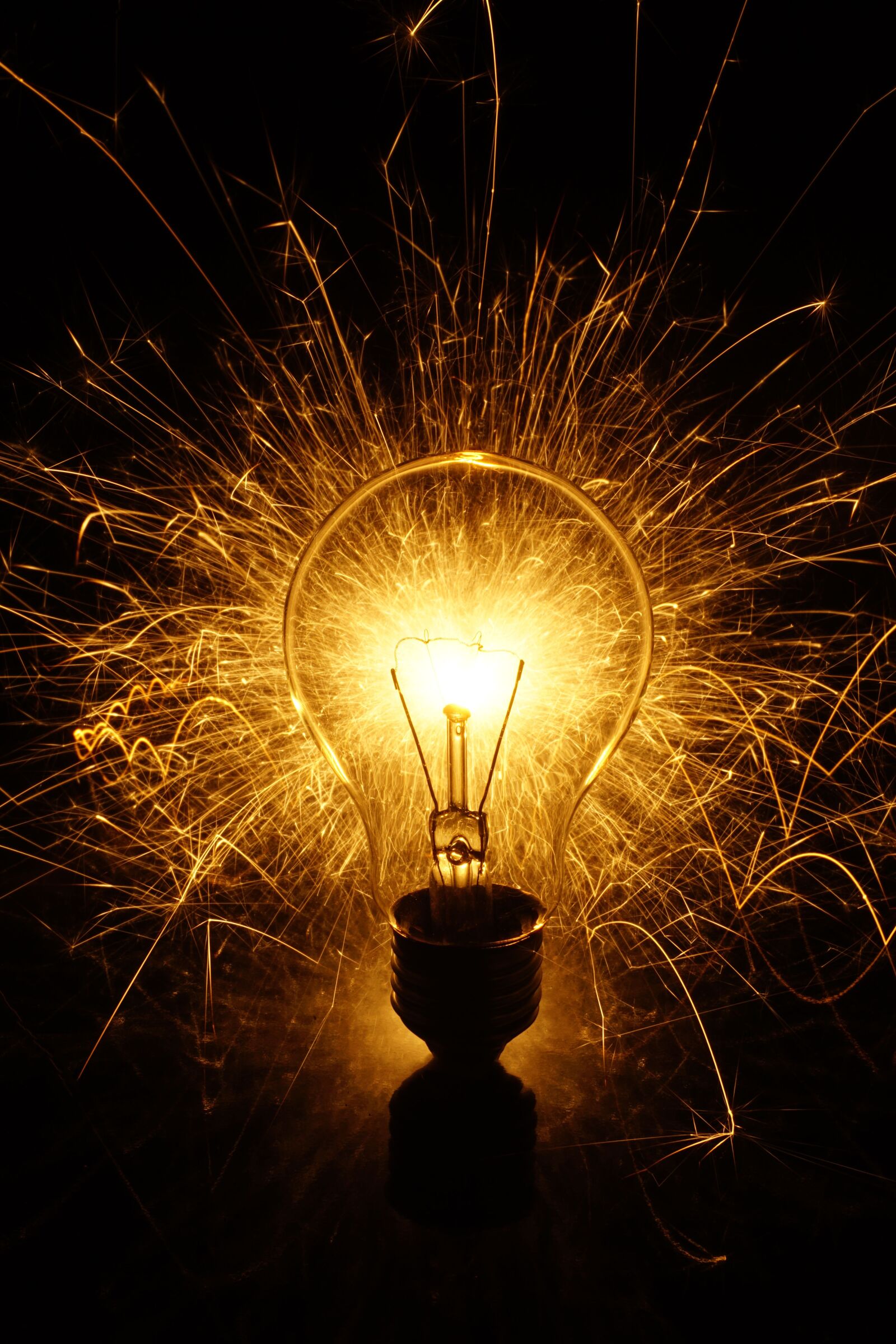 Sony a6000 sample photo. Light bulb, fire, rain photography