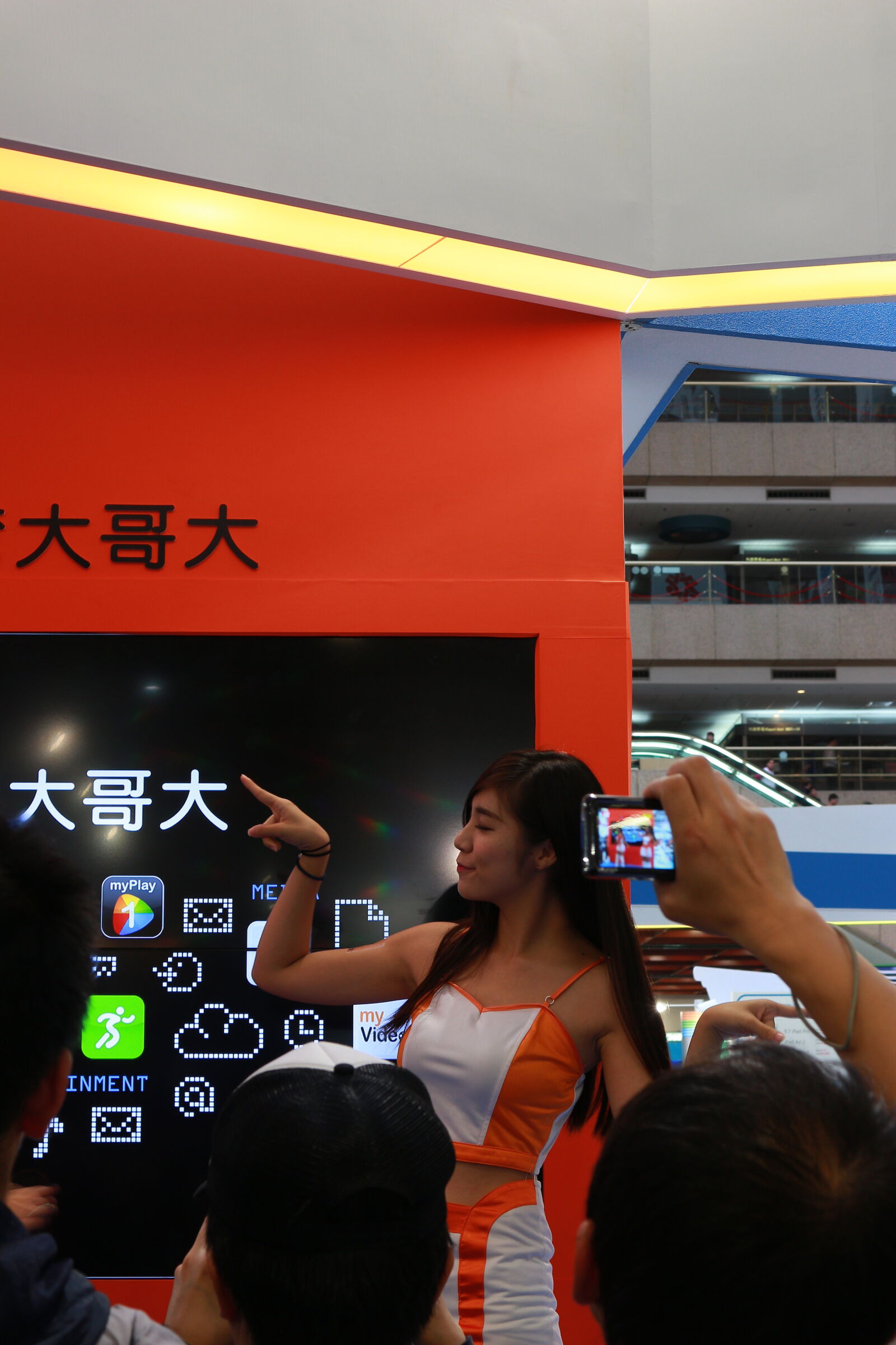 Canon EOS M sample photo. Young, woman, using, mobile photography