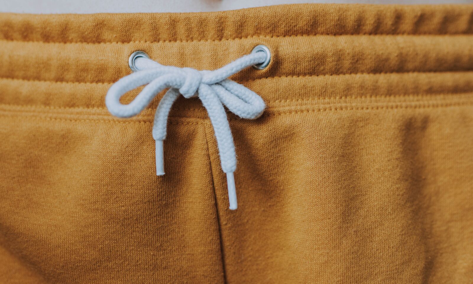 Nikon D5200 sample photo. Detail, pants, yellow photography