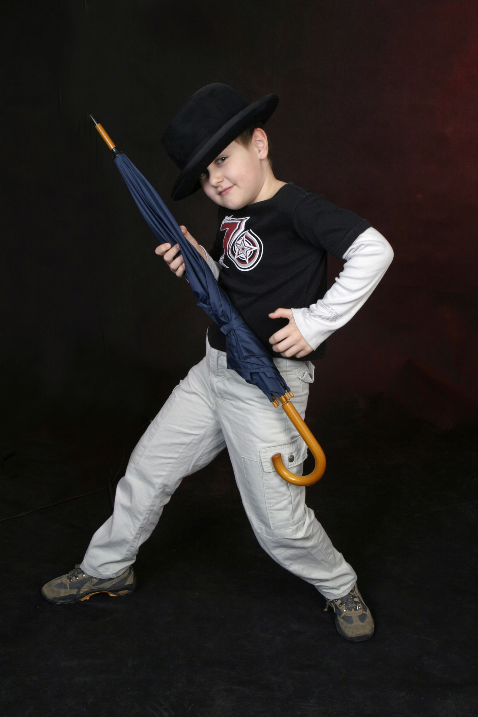 Canon EOS 10D sample photo. Boy, hat, rock photography