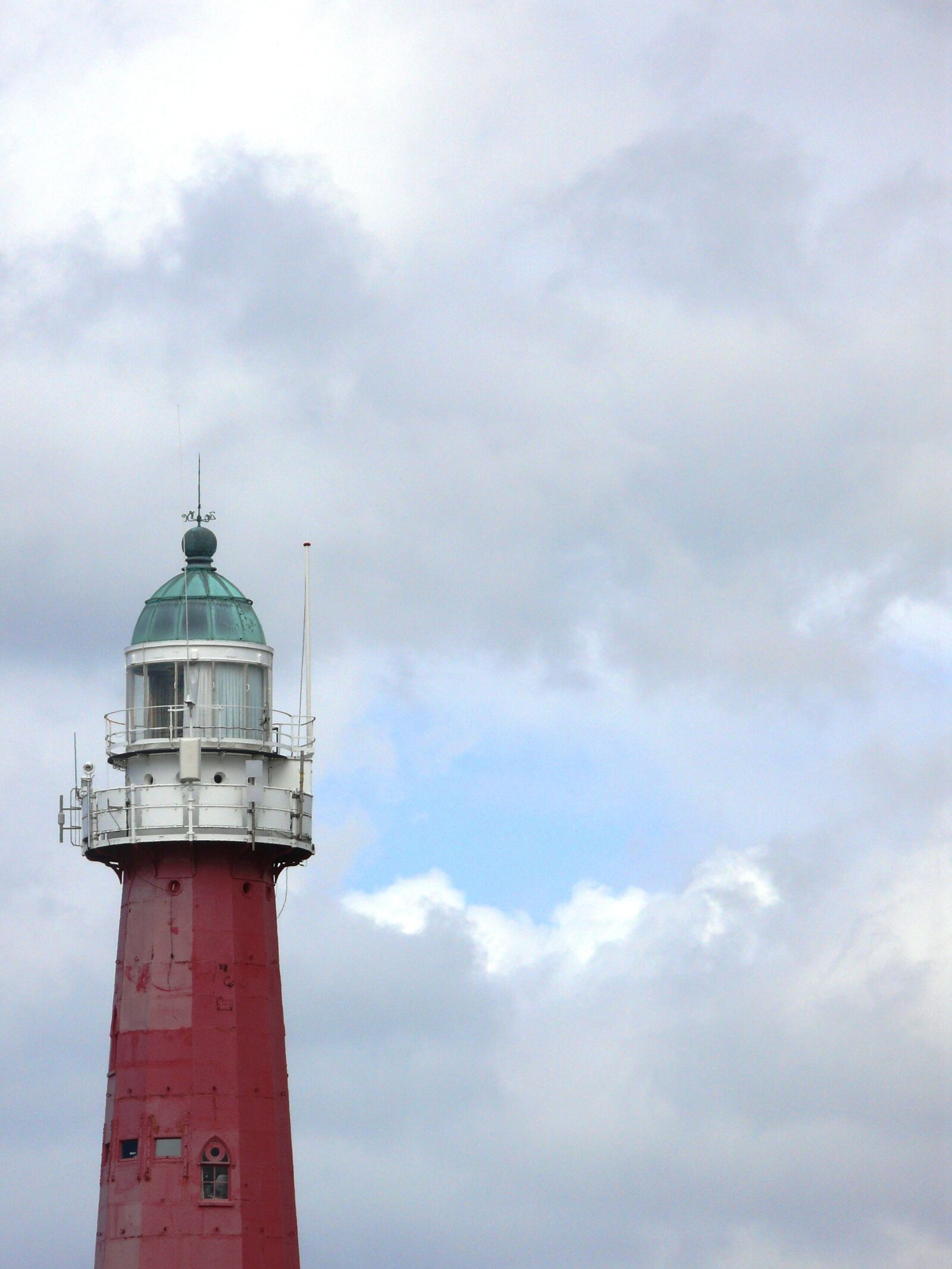 Panasonic DMC-FZ50 sample photo. Lighthouse, clouds, air photography