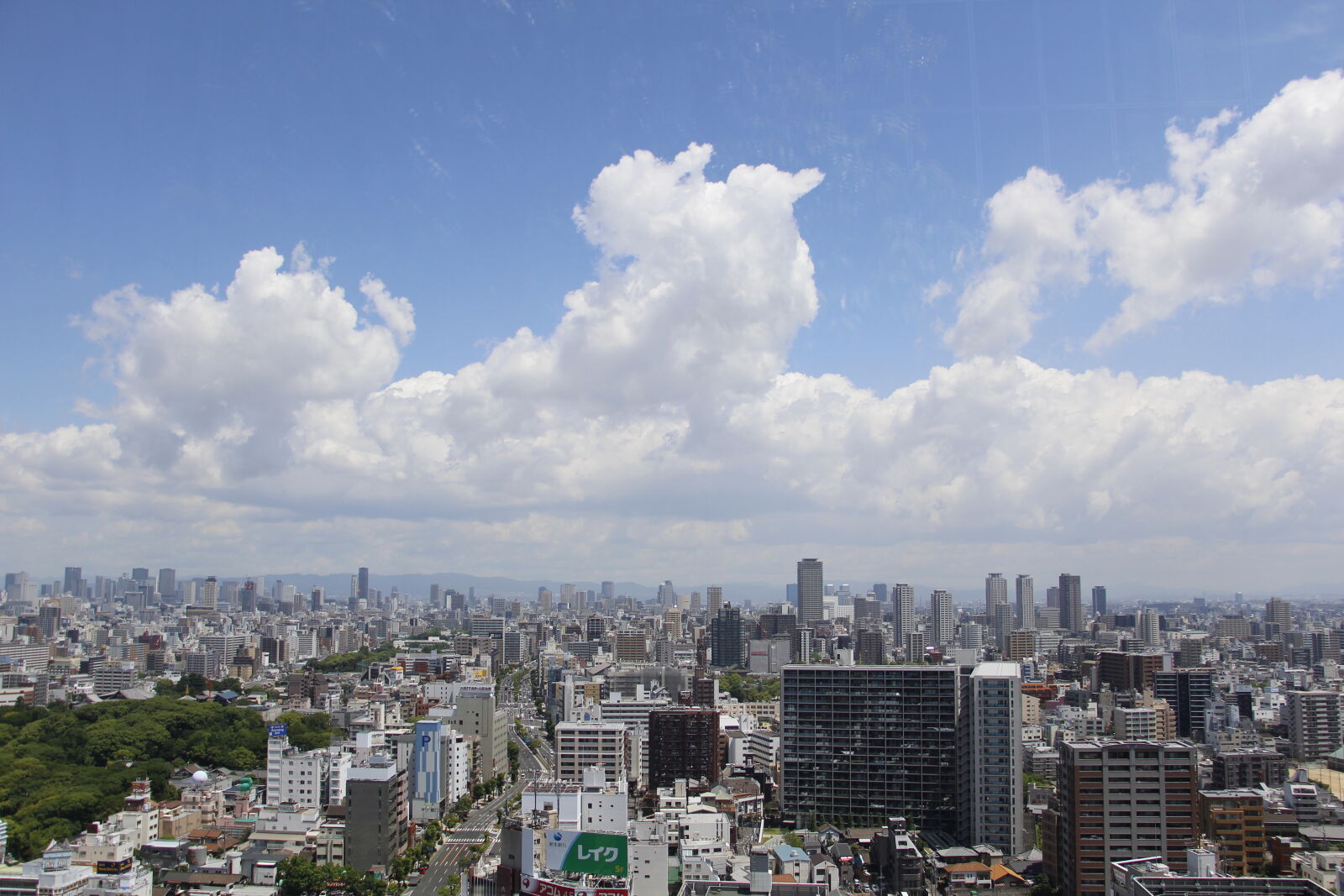 Canon EOS 100D (EOS Rebel SL1 / EOS Kiss X7) sample photo. Osaka, city, cloud, skyline photography