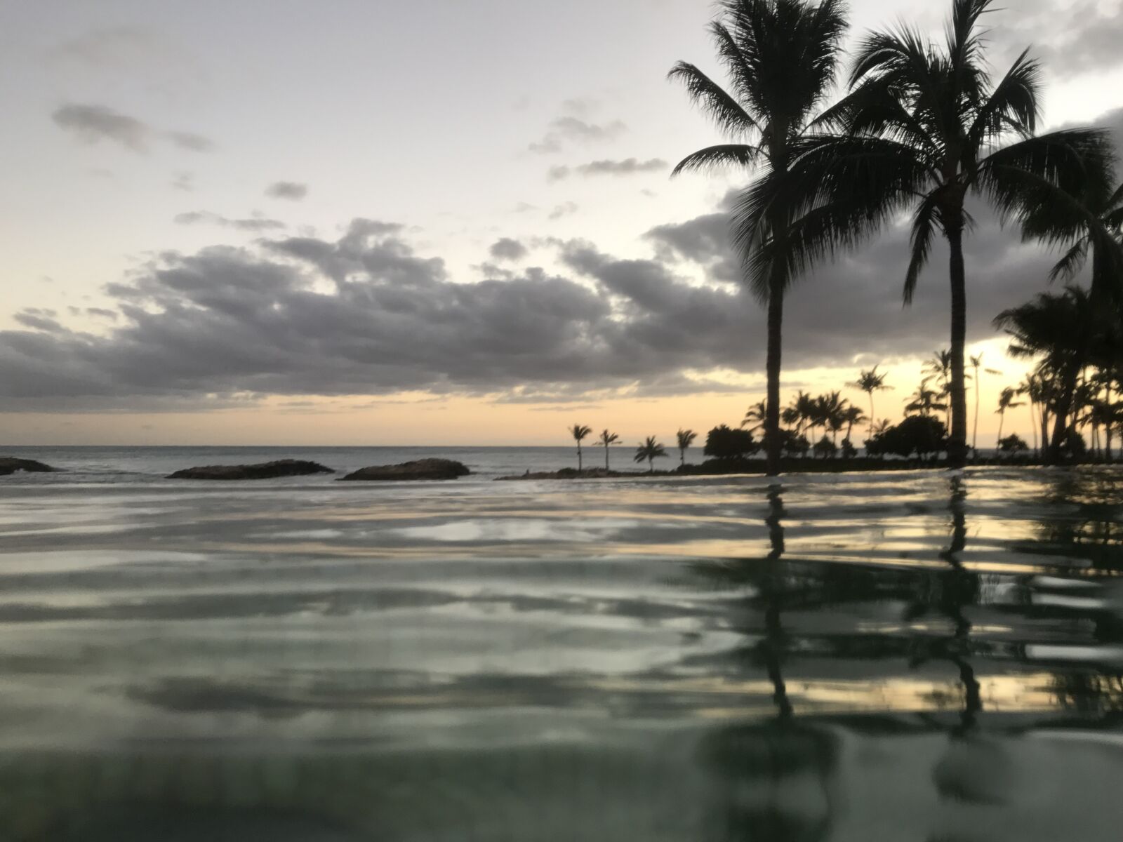Apple iPhone 7 sample photo. Infinite pool, beach, clouds photography