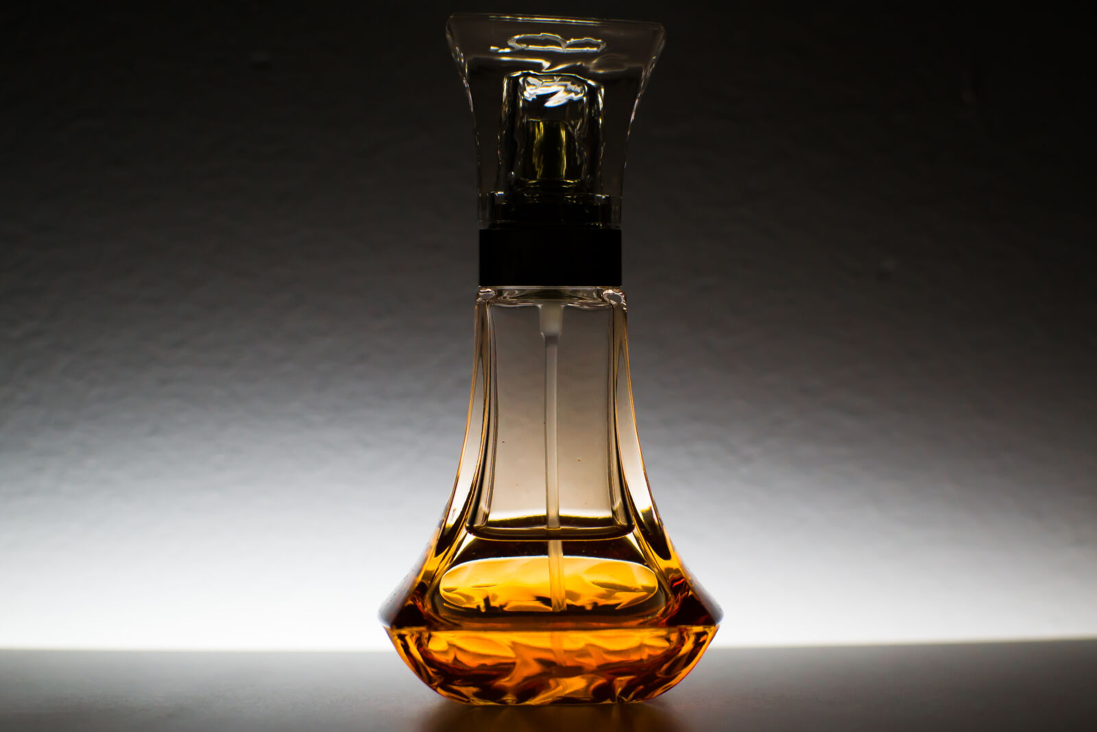 Nikon D3100 + Nikon AF-S DX Nikkor 35mm F1.8G sample photo. Bottle, container, glass, perfume photography