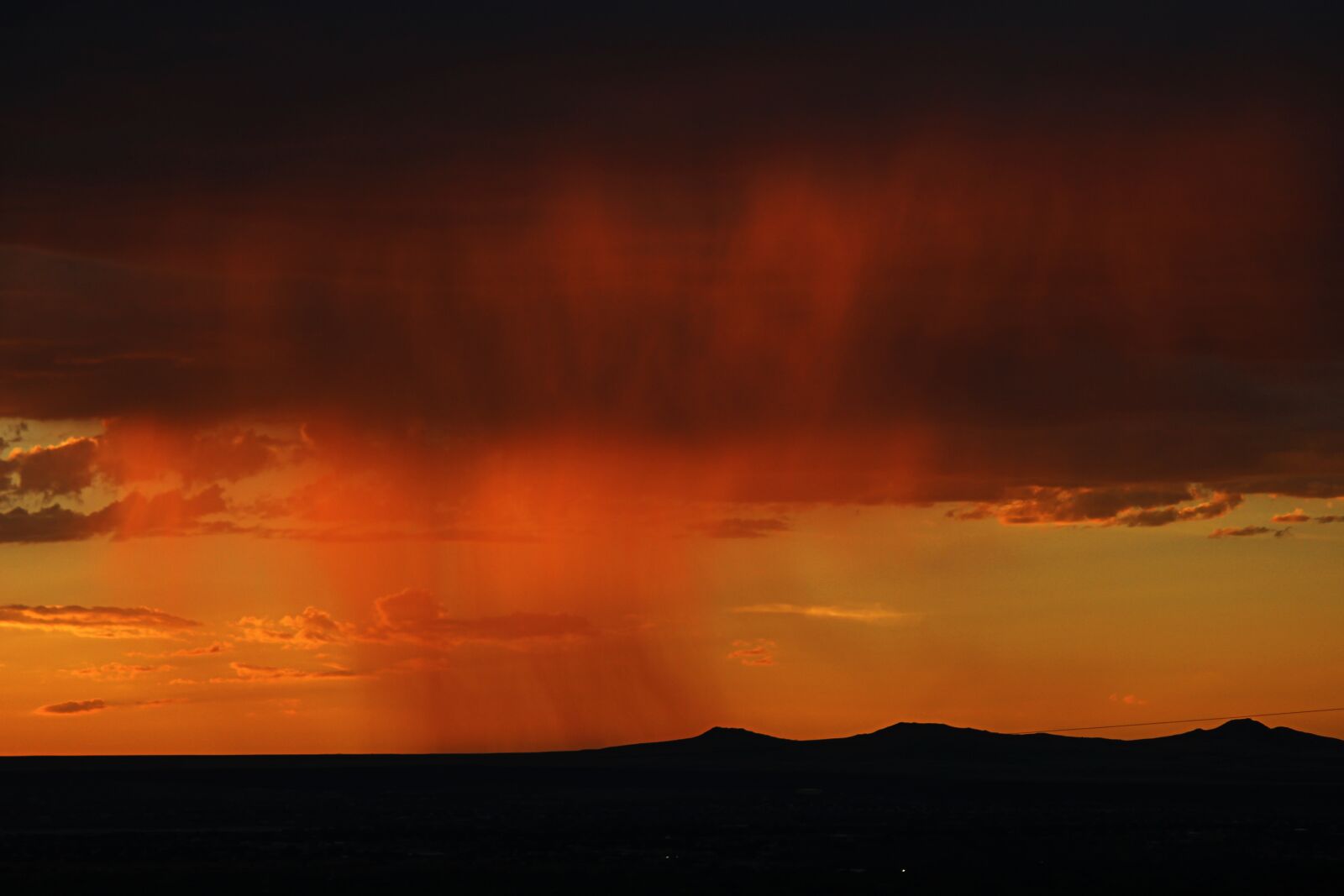 Canon EOS 100D (EOS Rebel SL1 / EOS Kiss X7) + Canon EF-S 55-250mm F4-5.6 IS II sample photo. Storm, rain, sunset photography