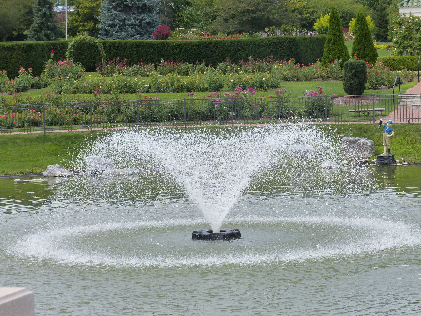 Panasonic Lumix DMC-FZ200 sample photo. Evergreen, flower, garden, fountain photography