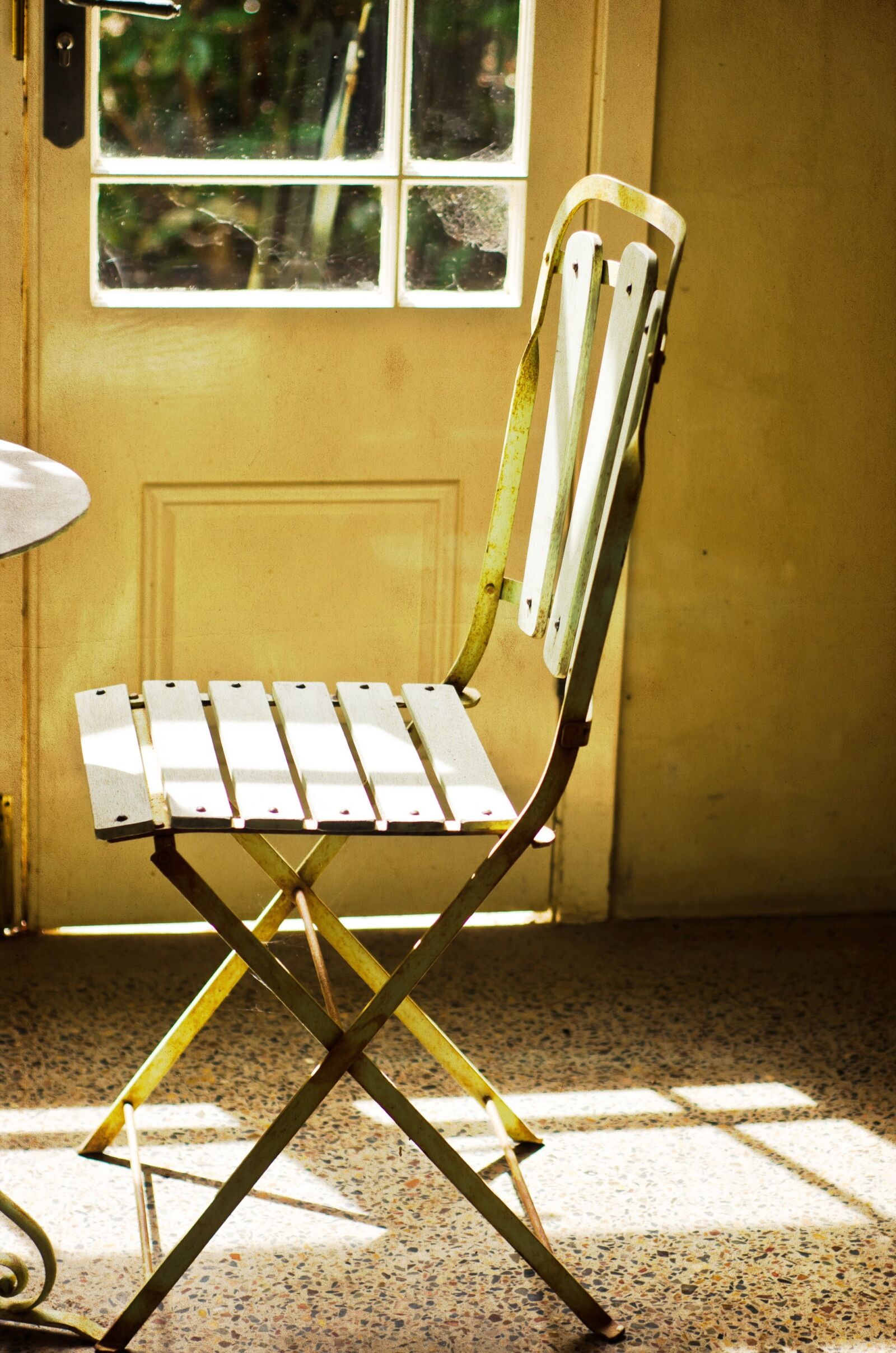Nikon D7000 sample photo. Sunlight, chair, door photography