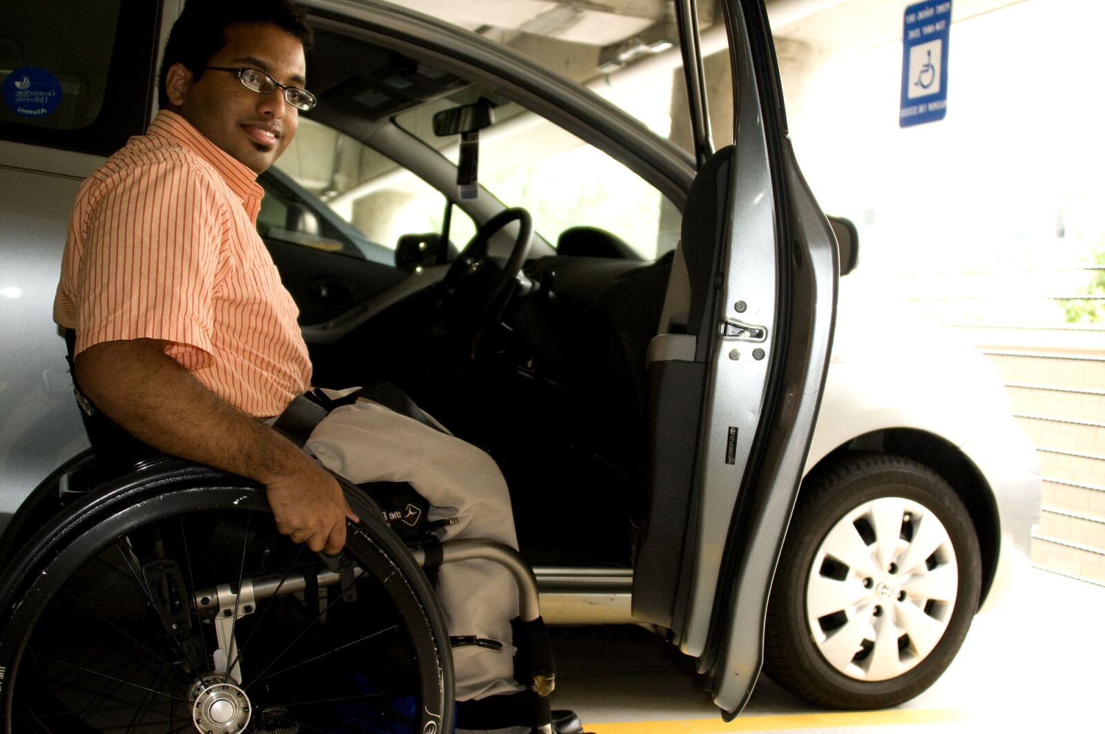 Nikon D300 sample photo. Man, wheelchair, car photography