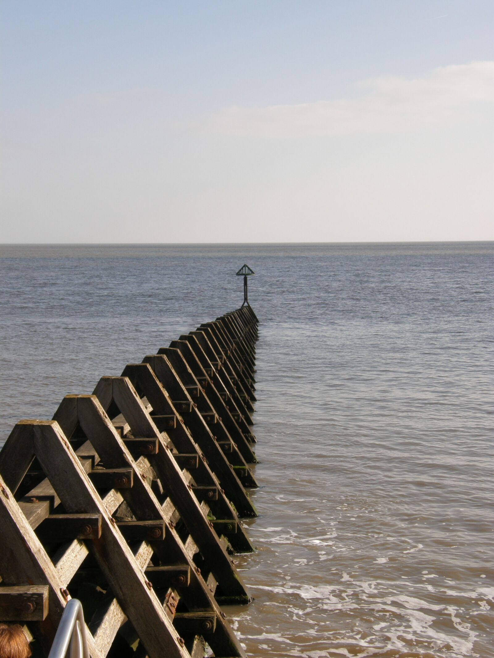 Olympus SP550UZ sample photo. Groins, sea, beach photography