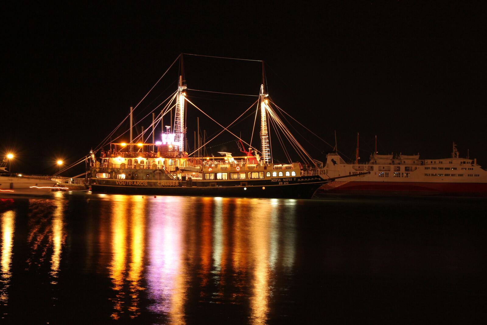 Canon EOS 550D (EOS Rebel T2i / EOS Kiss X4) + Sigma 17-70mm F2.8-4 DC Macro OS HSM sample photo. Night, sailboat, illumination, harbour photography