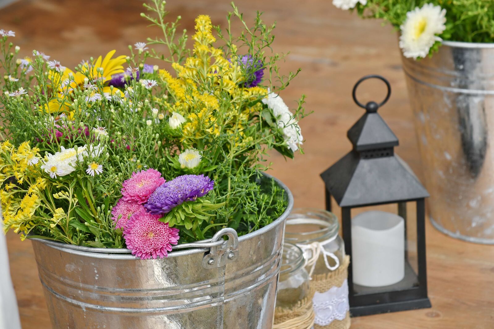 Nikon D5500 sample photo. Bucket, candle, flowers, jar photography