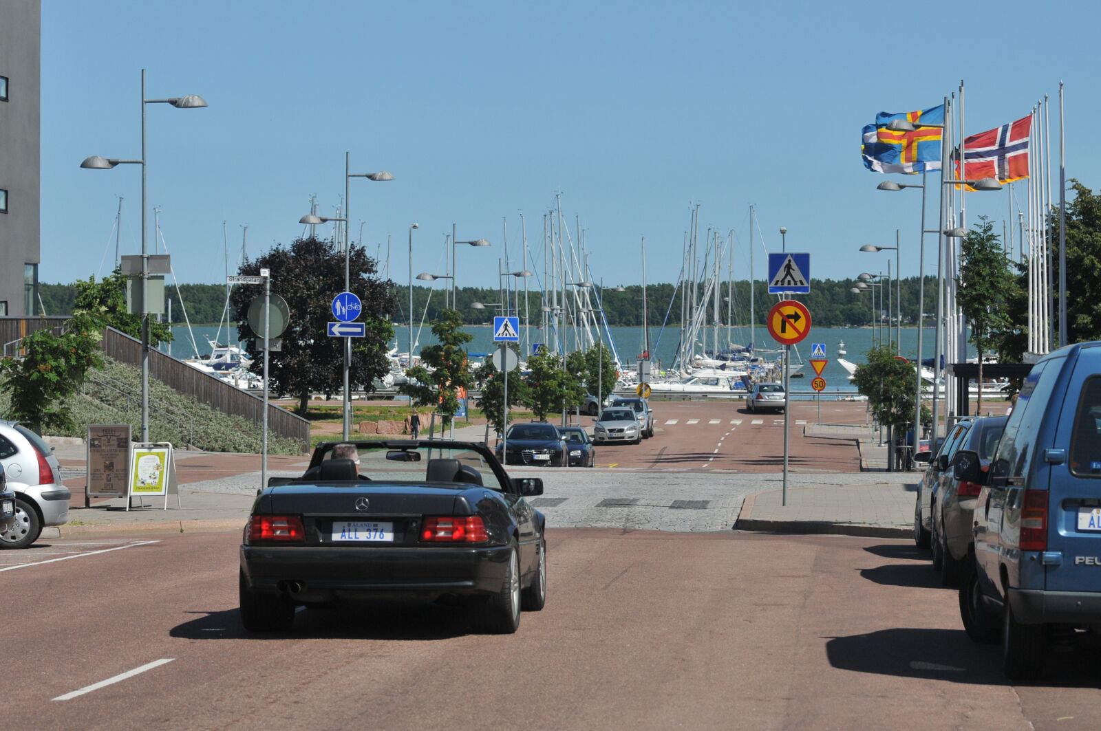Nikon D300S sample photo. Convertible, road, flag photography