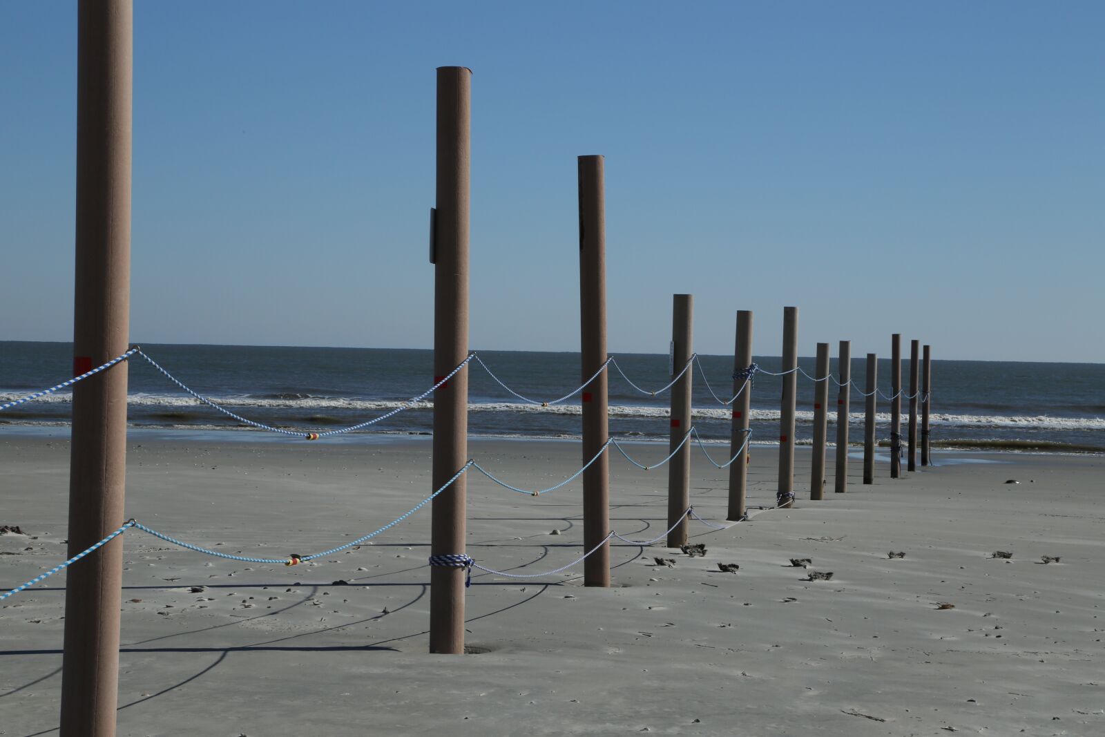Canon EF 24-105mm F4L IS USM sample photo. Beach, fence, wooden photography