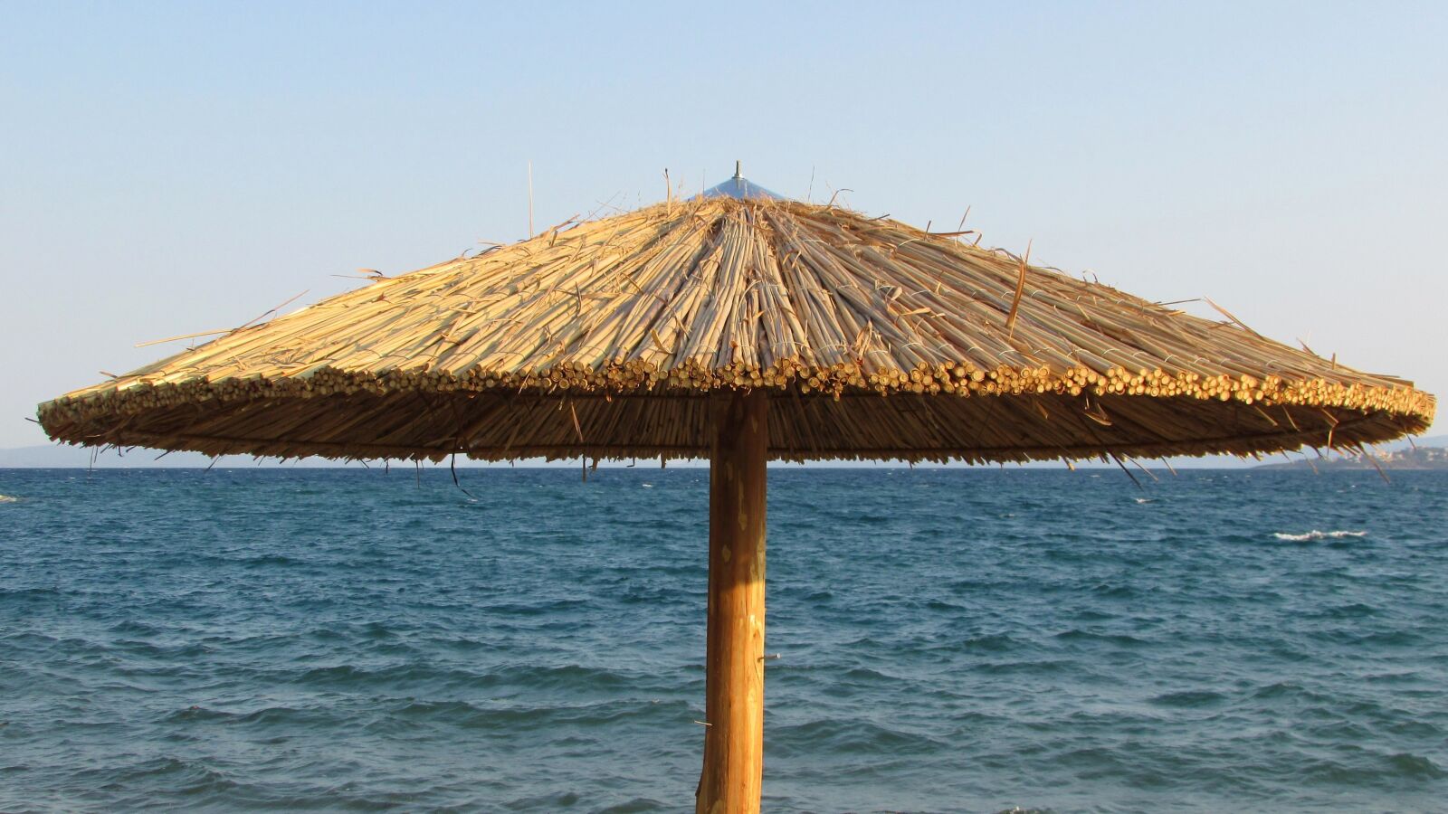 Canon PowerShot SX400 IS sample photo. Umbrella, beach, sea photography