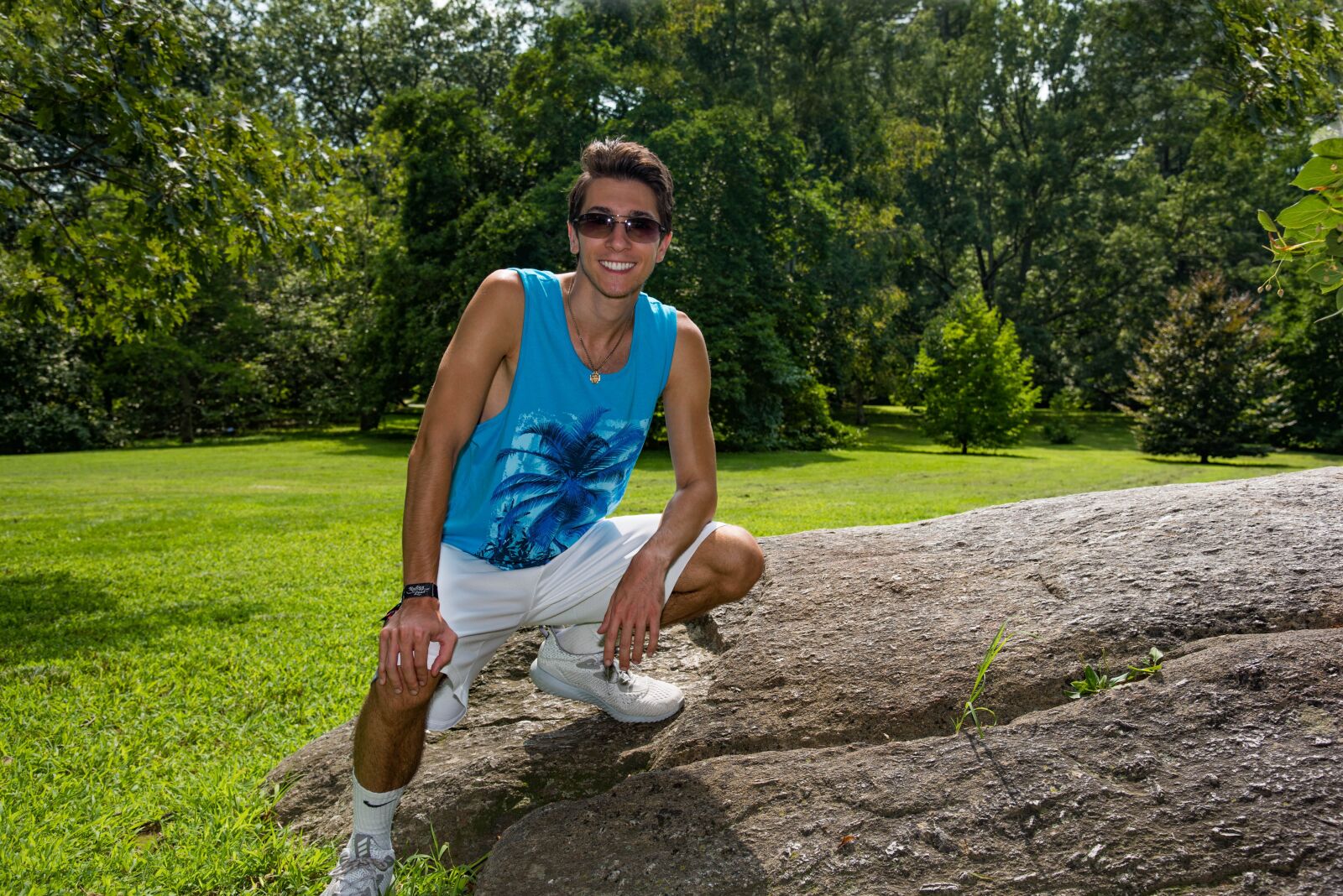 Nikon D750 sample photo. Young man, boulder, smile photography